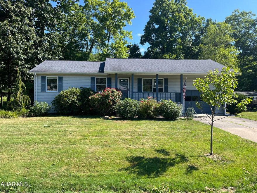 2 Bedroom 1 Bath Ranch with garage on private level lot in Logan Township.