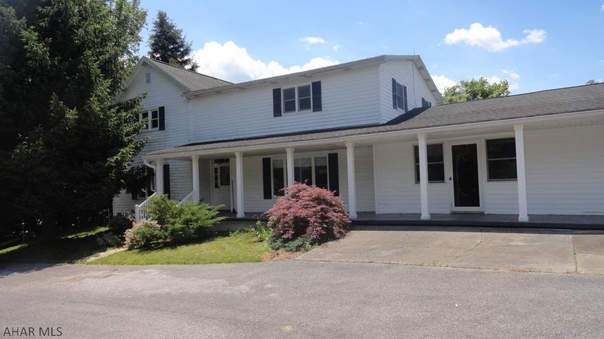 Country charm at its best.  Lovely 5 bedroom 3 bath that has been totally renovated and remodeled, new kitchen and baths, hardwood floors, large and spacious rooms, first floor master bedroom and bath, office to run your own business plus a 4 bay attached garage on almost 2 1/2 acres.