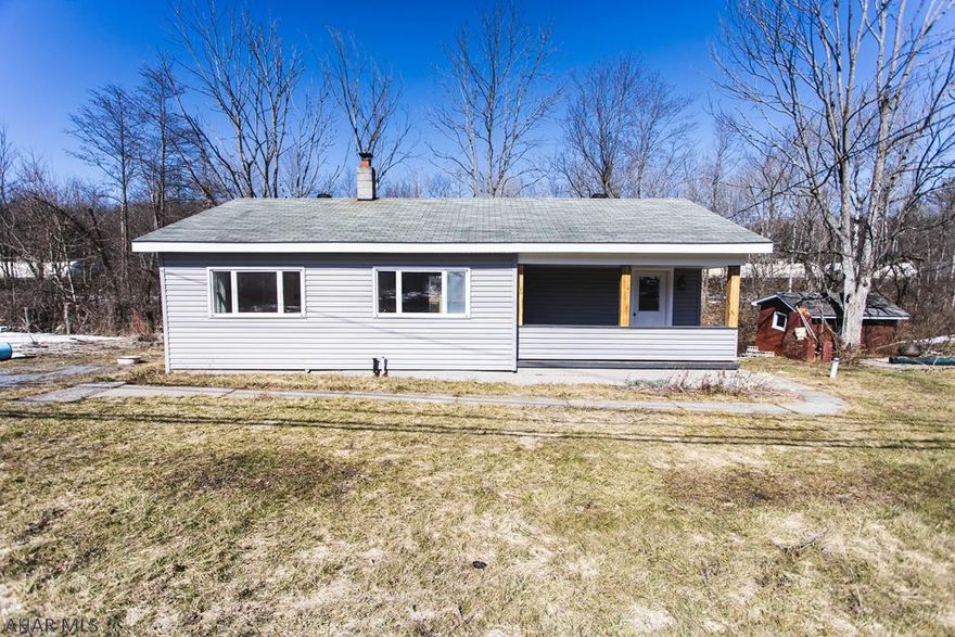 Don't miss this completely remodeled 2 bedroom, 1 bath ranch style house. New furnace (A/C coil installed inside furnace for central air), plumbing, electric, insulation, heat ducts, windows, siding, deck. New cabinets, counters, doors, appliances, bathroom. Hardwood floors and ceramic tile throughout the entire house. Wood plank slate front porch. Elevated deck over looking river on the back of the house. Schedule your showing today...this beauty won't last long!