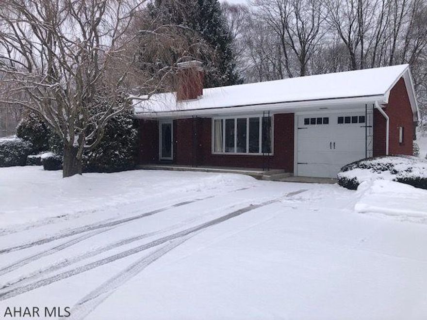 Location, location, location! 3 bedroom stick-built brick rancher in a desirable neighborhood with scenic views. Located on a back street with very little traffic. Open concept kitchen, dining room and living room. Hardwood floors in bedrooms and under carpet in LR and DR. Full basement with beautiful field stone fireplace and Alaska wood burner. Basement is open and could easily be finished for more living space. Municipal water and sewer, 200 amp electric, cement driveway with ample parking, and new hot water heater. Don't wait to see this one.