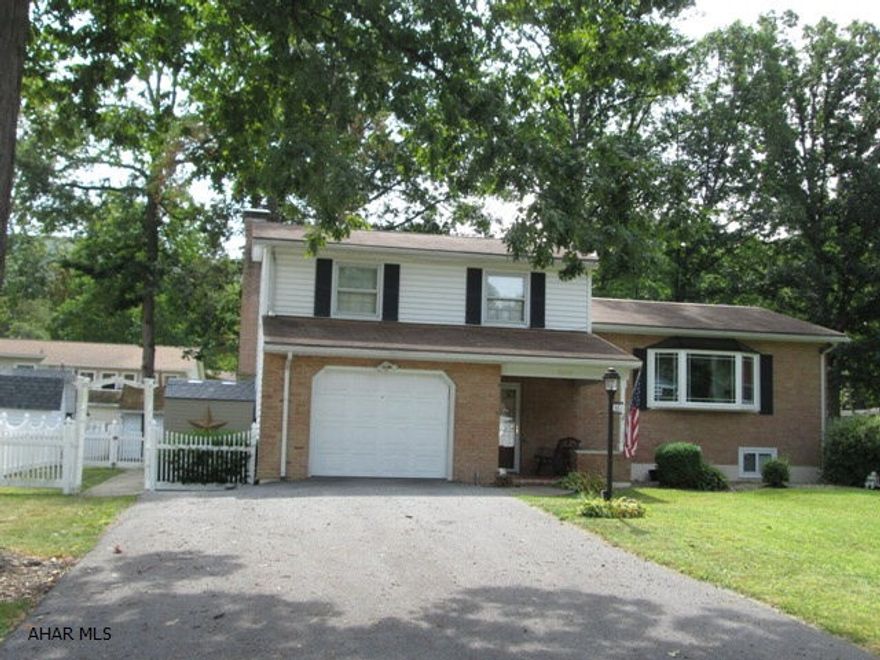 Logan Township/Greenwood - Custom built 4 bedroom with extra features such as rear sunroom and fenced yard. Large family room features wood burning fireplace. This well built home is located in one of the finest areas of Logan Twp. All appliances stay, home warranty included.