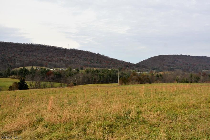 12 +/- Acres of land offering beautiful country views of the Mountains and Countryside in South Central, PA! Under ground utilities already on site with road frontage on two roads.