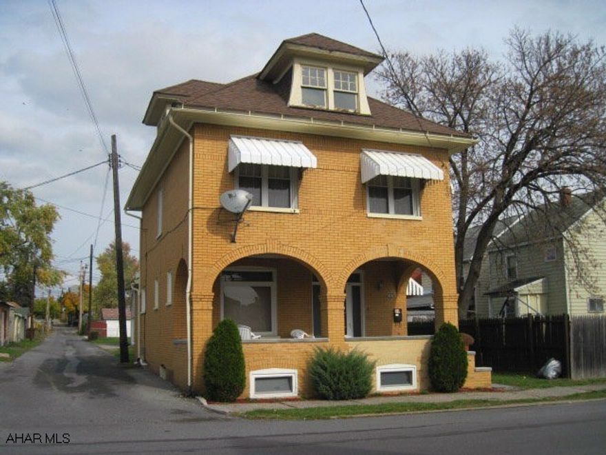 Brick home rented w / college students - grandfathered w / certificate of occupancy.  Leased till May 31, 2011.  New windows, new carpet donations, new furnace 3 yrs. old, ref. 3 yrs., heated attic for a 5th bedroom w / ventless gas fireplace, roof 10 yrs. old.  Good income.  Tenants pay electric.  Income $14,000 yr., utilities - owner pays - $1420 yr.