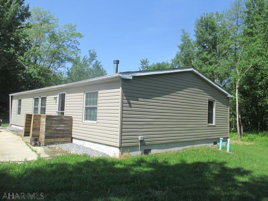 Hunter's paradise! Enjoy country living in this 3 bedroom, 1 story home on 27.3 acres near state game land in Blandburg. New roof, furnace, hot water tank, siding, central air, 2 sheds, and loads of parking. Home is on permanent foundation.