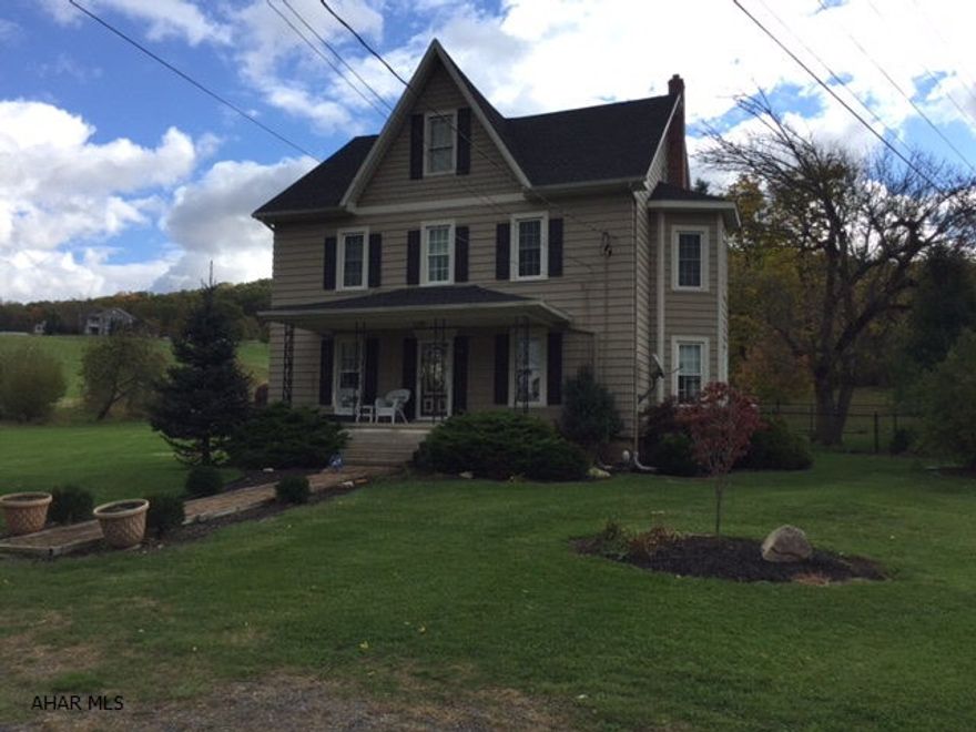 Totally refinished colonial farmhouse with huge rooms and tall ceilings. Move in ready on 2.2 acres. 3 Bedrooms, 2 bath with newer roof, windows and kitchen. Full bath on first floor. Country living only 3 miles from Rt 22.