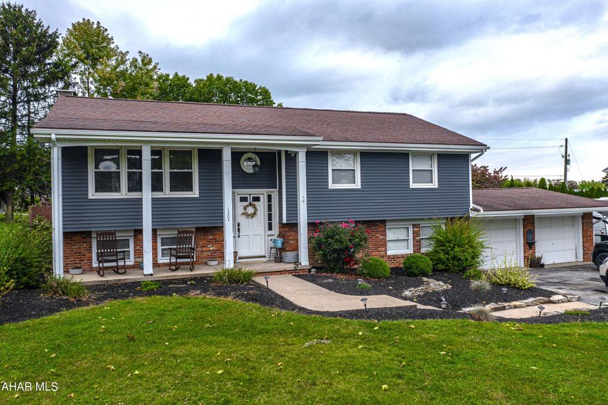 Move right in to this beautifully maintained & updated 3 bedroom, 2.5 bath residence in the desirable Penn Farms neighborhood - Hollidaysburg Area School District. 

This home offers a perfect blend of modern comfort and classic charm. Walk right into the bright, airy, and spacious living room, flowing into the dining room area and kitchen. The dining room includes a door to enter the enclosed sunroom, perfect for relaxing with your morning cup of coffee. The sunroom is attached to a large open deck that overlooks the huge privacy fenced backyard that you can imagine making your perfect backyard oasis. 

The finished basement boasts a gorgeous gas fireplace in the family room, a laundry room, and a bonus room that could be used as a recreational room, home office, exercise room, playroom, you name it! 

There is plenty of parking with the 2 car attached garage, large driveway, and extra gravel pad for parking an RV, work vehicle, trailer or just to use for extra parking for guests. 

Don't miss your chance to see this stunning home! Schedule a showing today before it's gone!