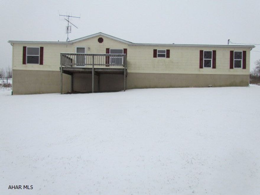 Well maintained doublewide home on 2.5 Acres in the Penns Valley School District. This home boasts 2 decks, plenty of parking and pastoral views. The large lot is great for entertaining. Home is on a crawlspace foundation. The well and septic will keep your utility expenses in check. A must see! Located in Spring Mills off Brush Mountain Road.