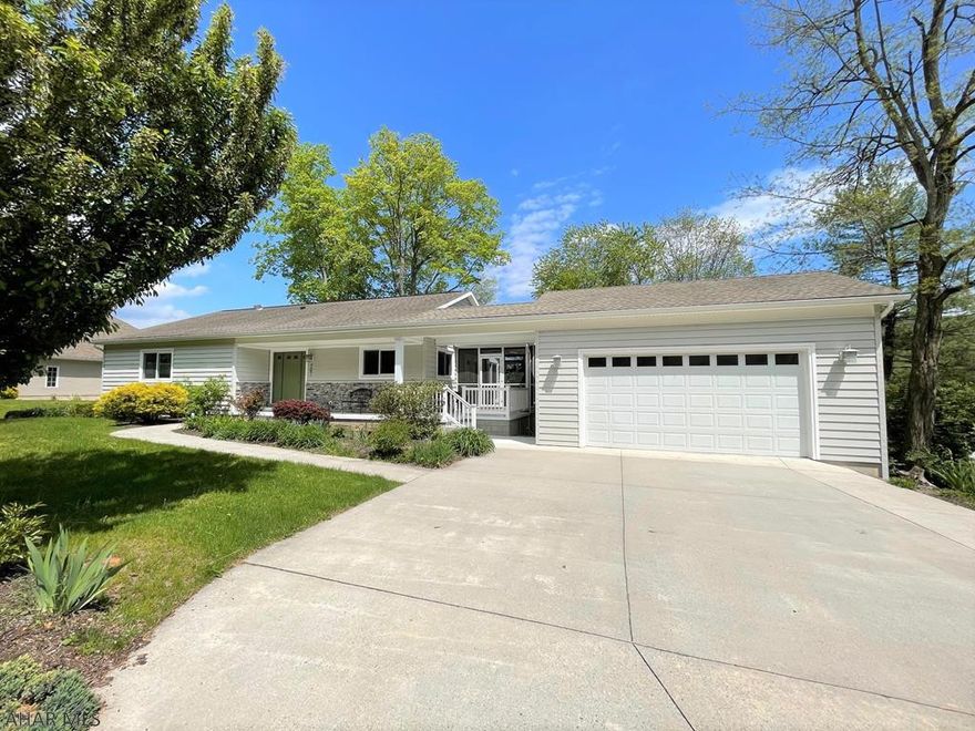 Exquisite custom built rancher with an excellent location!! Quality built home featuring a wide entry foyer, LR w/ cathedral ceiling, kit w/ granite counters, dining area, 2- bedrooms including a master w/ ensuite bath, laundry area & another full bath on the main level. Beautiful maple floors, tiled floors, gas FP, wood stove, & recessed lights. Full walk-out basement having a rec room w/ wet bar, another bedroom, a full bath & large unfinished area for storage. Great outdoor space w/ a relaxing side screened porch, front covered porch, upper deck, & spacious lower level deck. 2-car garage, double lot, mature landscaping, natural gas heating & central a/c. Short walk to the downtown area restaurants & shops, Elks Country Club & Omni Bedford Springs Resort, & easy access to major roads.