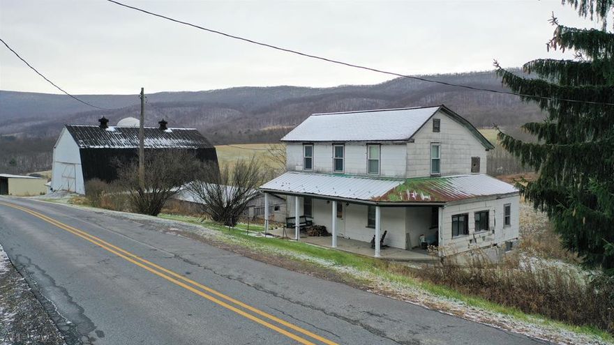 This picturesque farm is situated in Milligans Cove and rests on 259.87 acres!! Property offers rolling fields, woods, a large pond, and scenic views. Older farmhouse that could be rehabbed or razed for your new dream home overlooking fields and mountains. 48' x 60' bank barn, silos, and other outbuildings. Can be a working farm, weekend getaway for ATVing or hunting or your permanent residence for peace and quiet. Situated close to White Sulphur Springs Conference Center, State Lands and an easy drive to Maryland, I-68, the PA Turnpike and I-99.