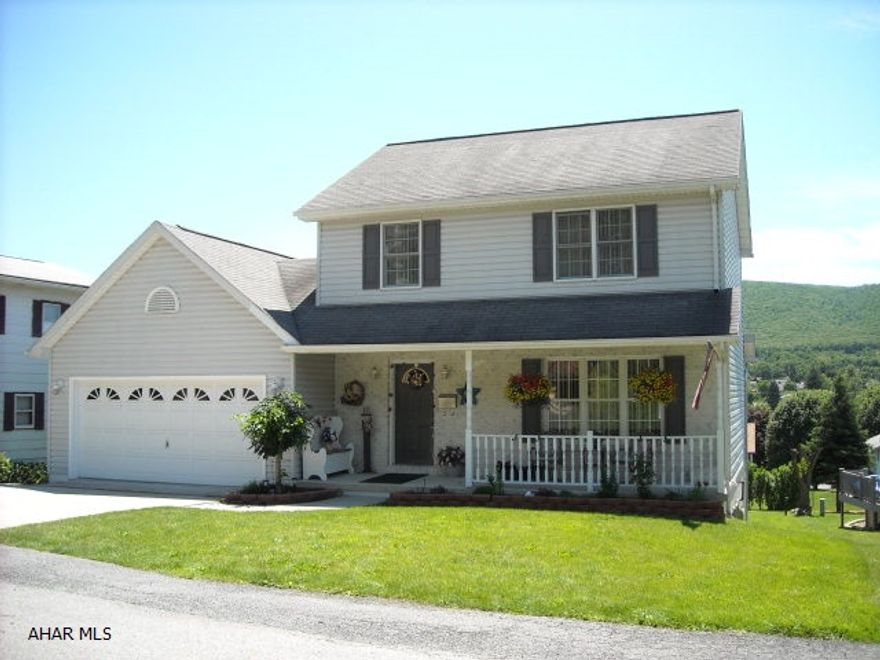 Beautiful 2 story in Pleasant Valley!  3 BR, 1.5 baths, fantastic finished lower level rec room with wet bar.  Nice deck in rear with breath-taking view of the valley & mountains.  High-Efficiency Gas forced air furnace with central air.  2 car integral garage with opener.  Neat as a pin home with a gas log fireplace in the living room, 200 Amp Breakers, and Central Vacuum System.  Pleasant Valley Elementary School.  Very handy area for shopping, travel, etc.  Nice yard in back with a cement lower patio and garden area.  Very Nice!!