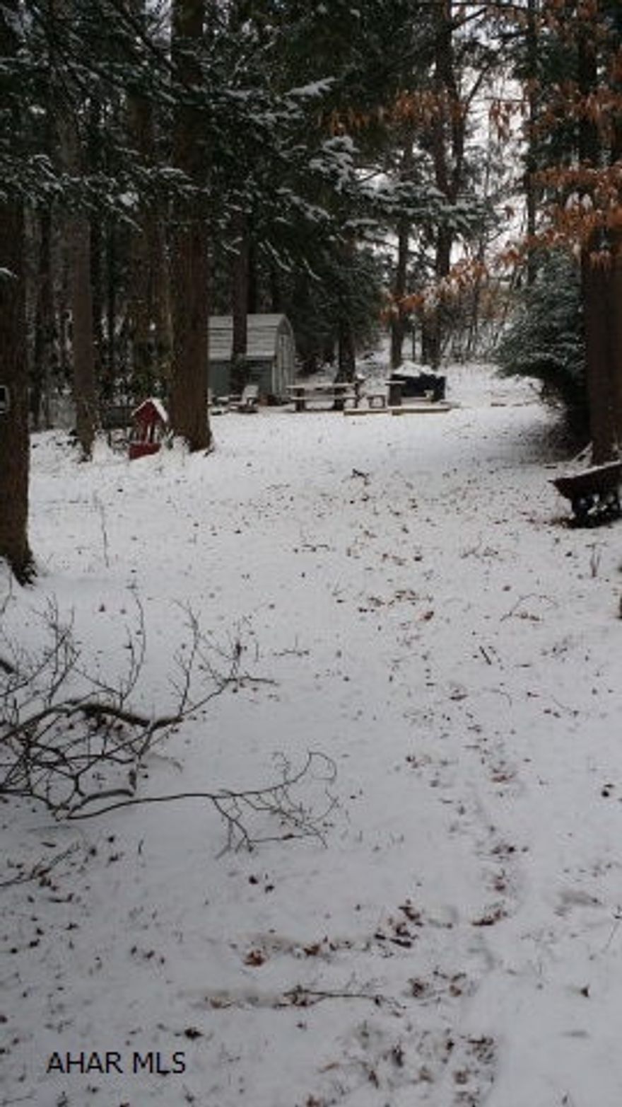 This is a vacant campsite in Glendale Yearound. Ready to use. Water, sewer and electric are in place. It comes with a shed and a small deck.
