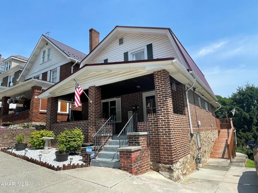 This beautifully maintained two-story home on a double city lot in Altoona gives space to stretch your legs inside and out! Current owners have renovated most of the home which includes new roof new windows new flooring throughout first floor and newer appliances and they even kept the charm of the original woodwork and pocket doors. This home has spacious rooms which make it great for entertaining family and friends. The first floor laundry is convenient and the half bath keeps guests on the main floor. Second floor has three spacious bedrooms all with new carpet, a walk in hall closet and a large updated bath.  Enjoy grilling this summer on your private deck or simply relax on your large covered porch.  The basement has a finished family room/entertaining area.  Large parking pad for vehicles. Plenty of grass area!  Nothing to do but move right in.  A few minute commute to Penn State Altoona and the Altoona Hospital. Motivated seller!