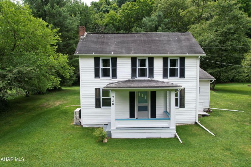Come and sit on this lovely porch and enjoy the country views.  This beautiful1/2 acre lot is situated in the foot hills of the Allegheny Mountains.  This home has a bedroom, full bath, and laundry on the first floor.  2 additional bedrooms on the second floor.  The first floor bedroom can also be used as an additional living room, bonus room or office.   The kitchen has the original cabinets giving it a warm country feel.  Nestled against the mountains wildlife prevails.  Complete with a grape vine, garage/work shop and nice flat back yard for a garden or an out door living space.  Wills creek and state game lands are in close proximity to this home.   Just a 2 hour drive from  Pittsburgh,  DC, and Baltimore.