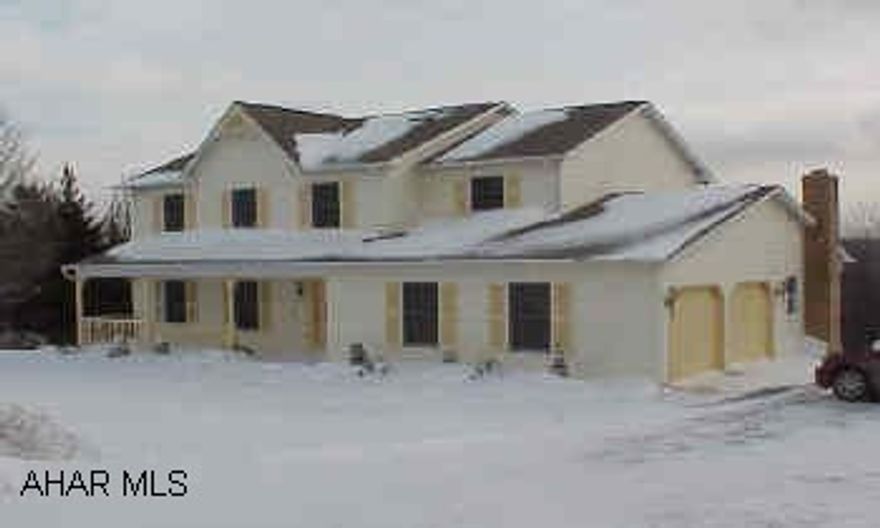 Large 2 story colonial.  Big bright rooms, oak kitchen opens into family room, unfinished 21 x 13 Fam Room with brick fireplace in the basement.  Buyer needs to hook up to public sewer.  Tap is paid.