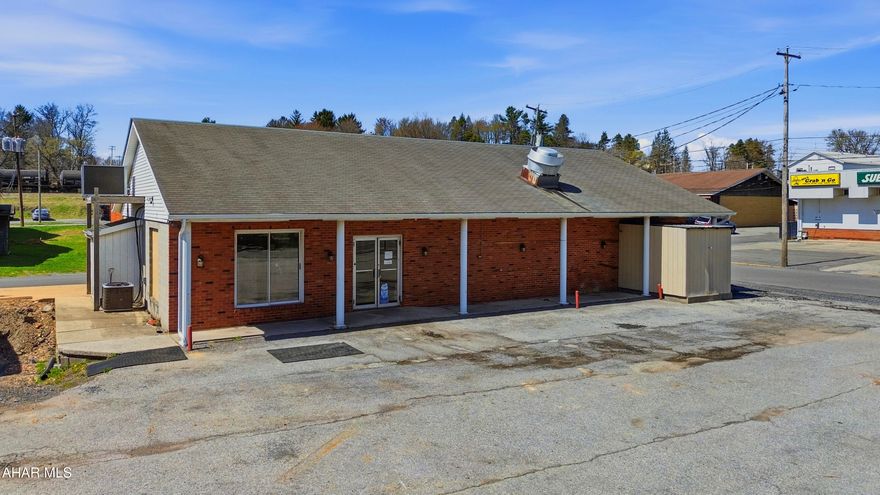 Prime commercial opportunity in the heart of Cresson! This highly visible corner property is positioned in a high-traffic location and offers ample on-site parking for customers and employees. Surrounded by established businesses - including a busy laundromat, grocery store, liquor store, pharmacy, Sheetz, and more - this location benefits from consistent daily foot and vehicle traffic. Previously configured for a restaurant and beer distributor, the building offers a functional, open layout that could be easily adapted for a variety of commercial uses. Whether you're looking to open a retail store, restaurant, office, or service-based business, this flexible space provides excellent potential. Recent updates include improved lighting, newer furnace, ceiling tiles, and additional cosmetic improvements. Take advantage of this prime location and bring your business vision to life. Call today for more information!