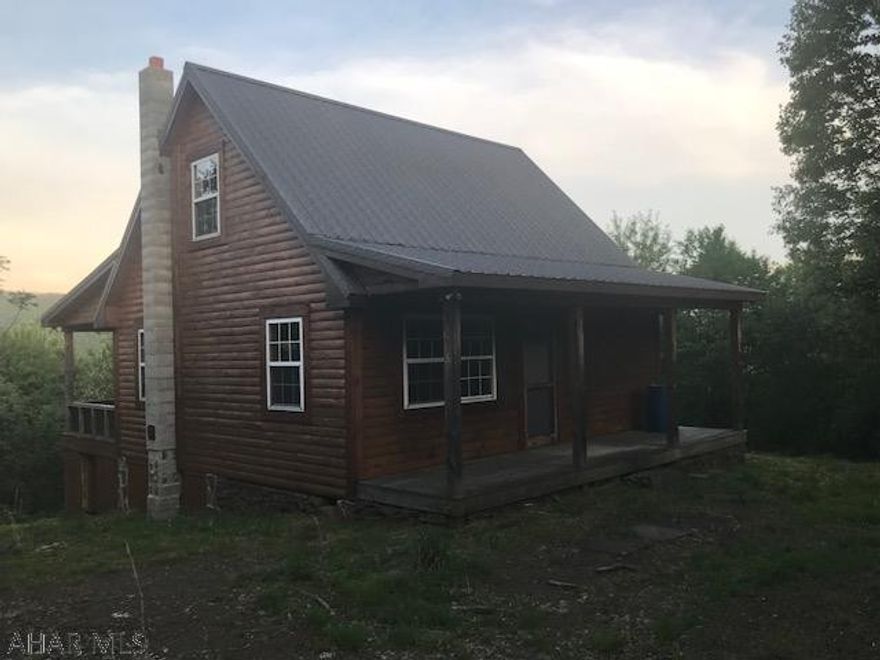 Lovely hunting or recreation cabin with stunning views.  247+ acres of wooded hunting grounds adjacent to state game lands.  A must see for all outdoorsmen.