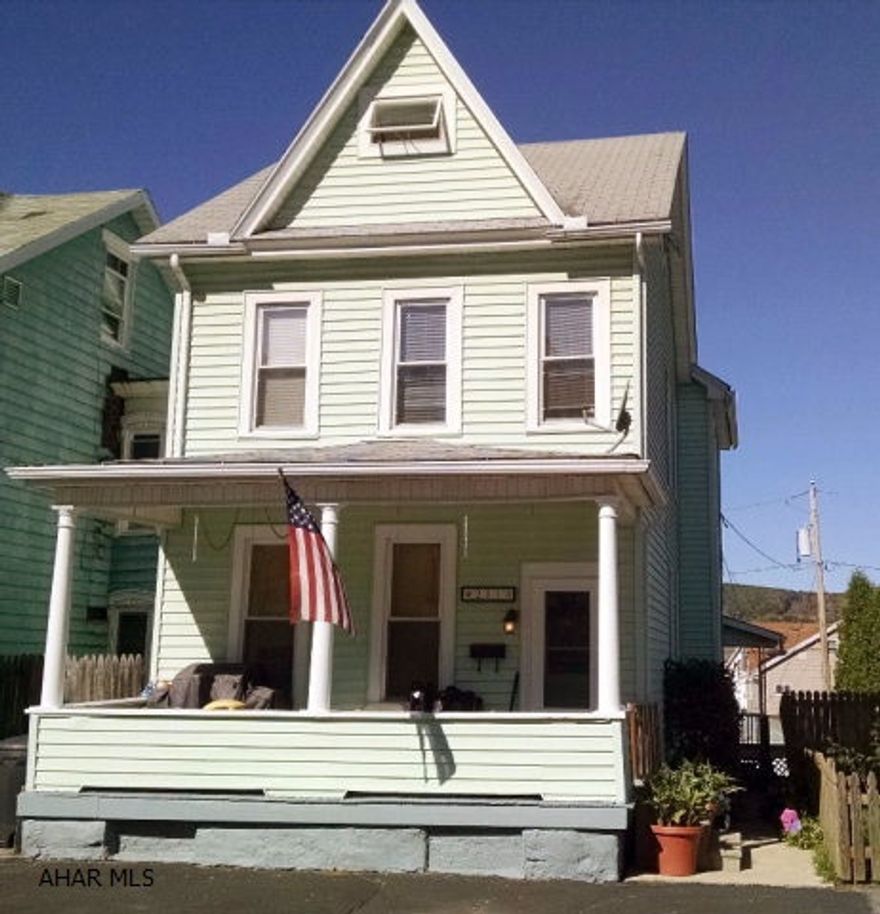 WOW, what a great home! Updated, roomy and well cared for. Newer windows, vinyl siding, closed in back porch, front porch, 1 1/2 car garage. This home is a must see, move in ready just waiting for a new family.