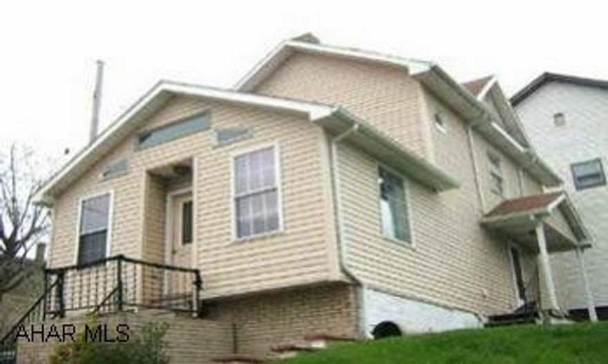 Competely remodeled. Ceramic tile floors in kitchen, pergo in LR & DR, 1st fl laundry, new windows, vinyl siding, very close to schools. Start out here! Nice block.