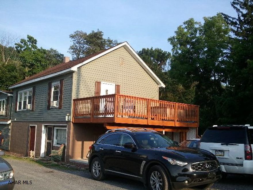 The owners of this 4 unit are currently living in unit 3.  It should rent for $650/month.  None of the tenants have a lease and no security deposits have been collected.  Although rents include water and sewer, each unit has its own meter.  All units have new hot water tanks & plumbing.  Each unit has its own furnace, 3 have window A.C. units, and all have $500 space heaters.  New 12 x 20 tek deck.  Hot tub, window treatments & alot of the furniture stays.  Roof 2 yrs old.