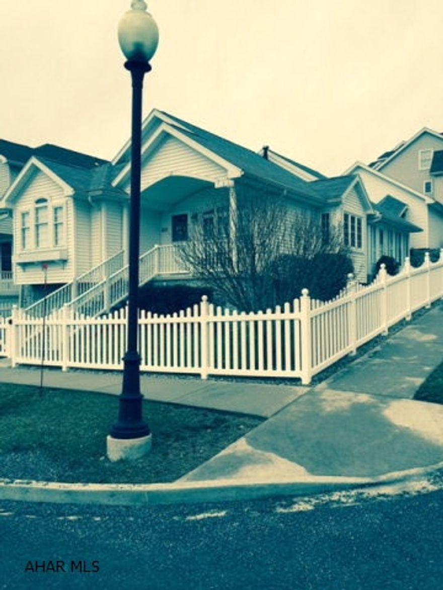 Absolutely terrific custom built home on 45x100 fenced corner lot. Upgrades galore! Skylights, heated and cooled sunroom, finished family room with fireplace and bath, cherry hardwood floors, 2 car garage w/ covered walk way..just to name a few! Immaculate and ready to move in!