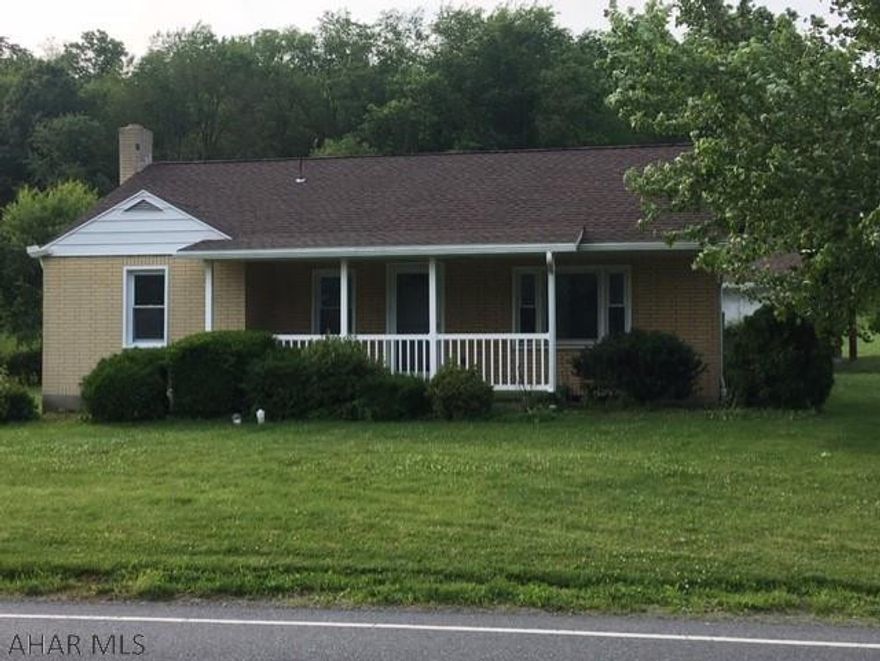 Solid home with 3 bedrooms, 1 bath, large 2 car garage, large pole building and separate shed. Original hardwood floors throughout. Spacious back yard perfect for picnics and family. Close to town. Perfect starter home to forever home. New roof installed June 2019.