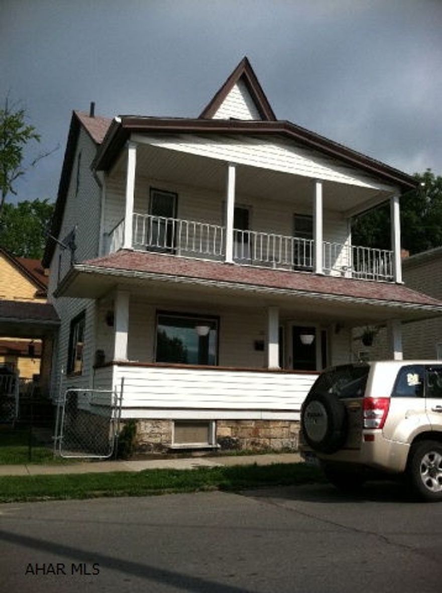 Large home on corner lot. Nice fenced yard. Updated mechanics and remodeled 1st floor. Master bedroom with balcony and space galore! Great starter or investment property!