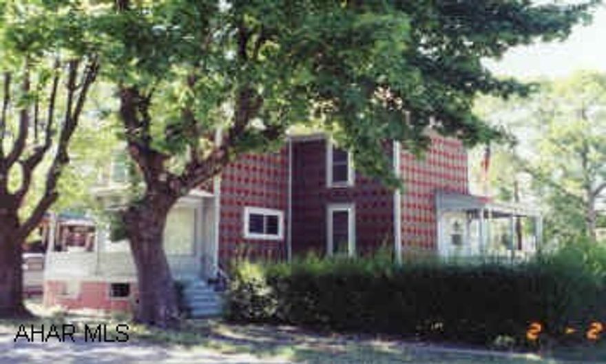 Lots of house for money, large corner lot, new windows, newer roof.