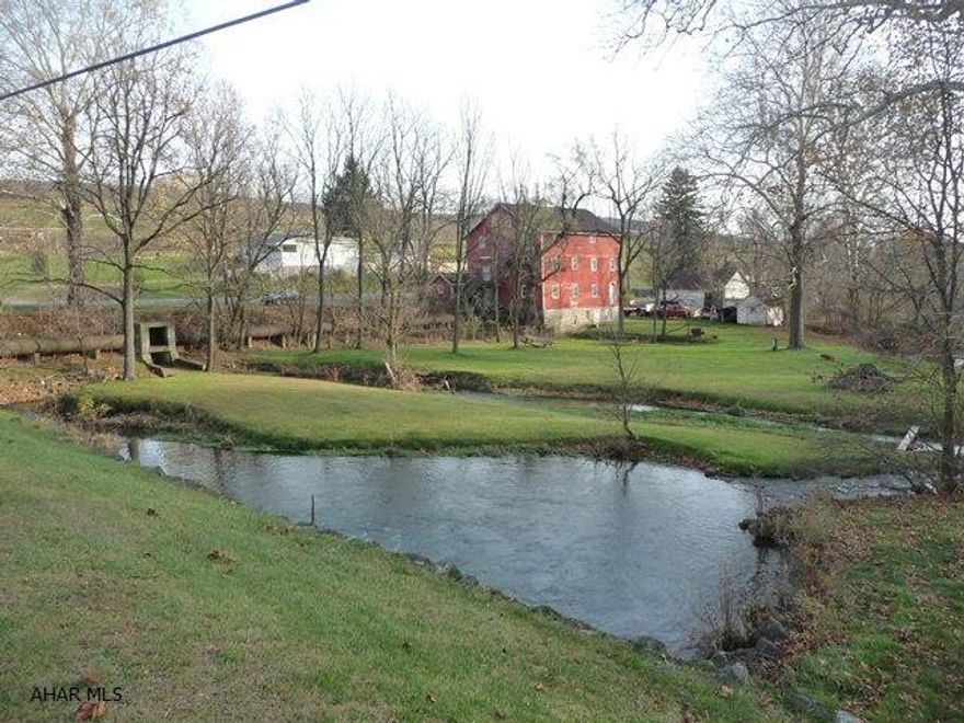 Old Grain Mill with 2.88 acres. Historic old grain mill equipped with a lot of original milling equipment. This property is located along Yellow Creek, a major trout stream. The mill could be restored to its original purpose or the property could be utilized for some business opportunity along PA 36. The additional 2 lots totaling 15.704 acres is not being offered but may be negotiated at an additional price.