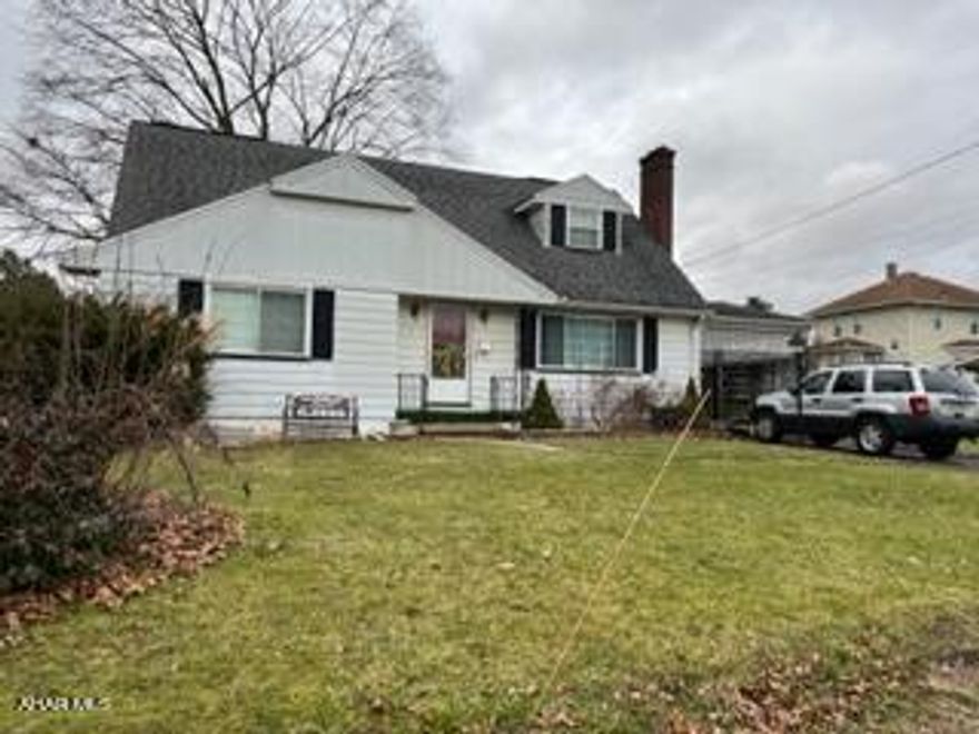 Spacious 4 BR 3 Bath home.  Large rooms, beautiful fireplace in living room.  Carport/patio.  A very charming home. 3rd Bathroom in the basement.