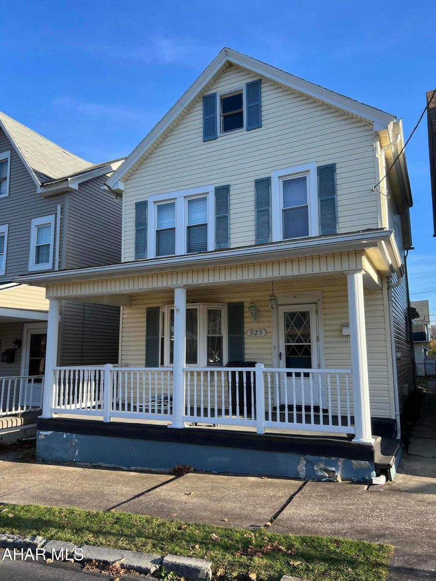 4 car garage!! Roof, furnace, central air:2014, Kitchen and Bath are designer updated beautifully, with 2nd floor laundry: 2015. Newer Refrigerator and Dishwasher.   Insulated windows, Front and back covered porches, ''L'' shaped lot!  Hard wood floors through out!  Bay window in the living room, beautiful staircase, charming pocket doors, and nostalgic butler's pantry in the kitchen.  A must see!