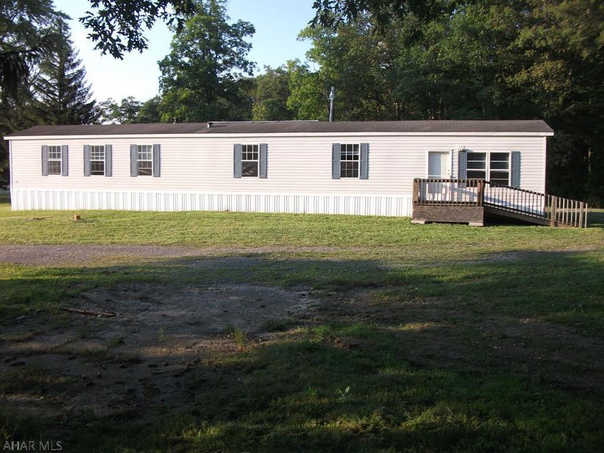 Well kept home on large flat lot just minutes from Shawnee State Park.  Cathedral ceiling and large sunken kitchen.  All appliances included.  Private setting with easy access.  Large well build storage shed. A must see.