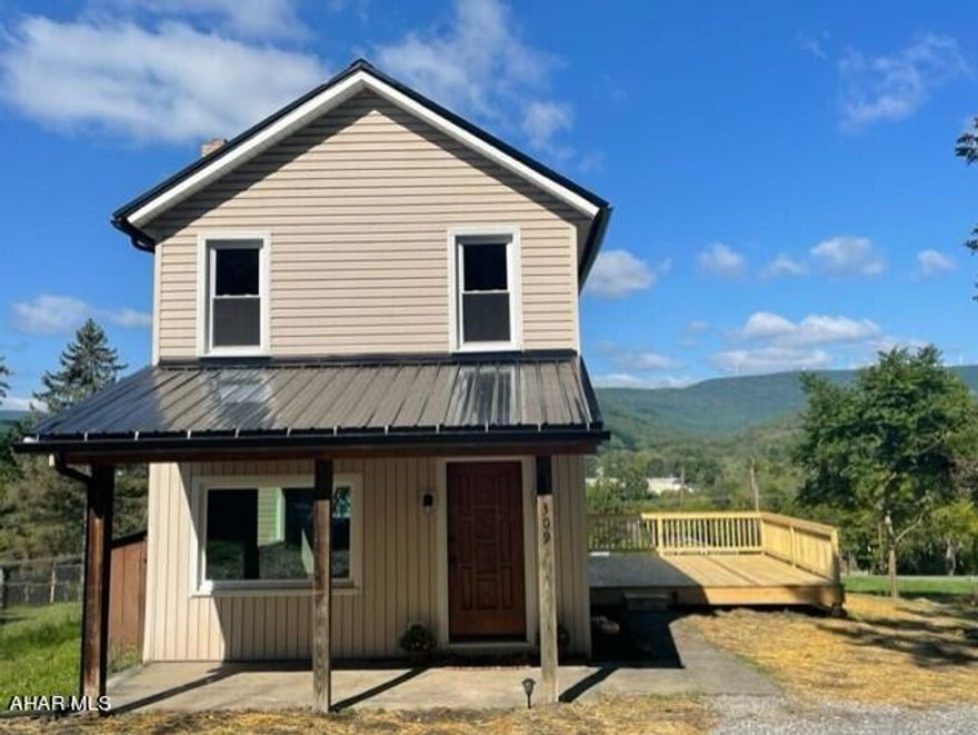 Newly remodeled 3 bedroom and 1.5 bathroom home located outside of Tyrone on a huge lot.
New roof, new windows, new furnace, new bathrooms, new kitchen, new appliance's, new 2nd floor laundry station, new flooring, and a new deck.  Updated 200 amp electric service.  All new plumbing and hot water heater.  Amazing view of the mountains.