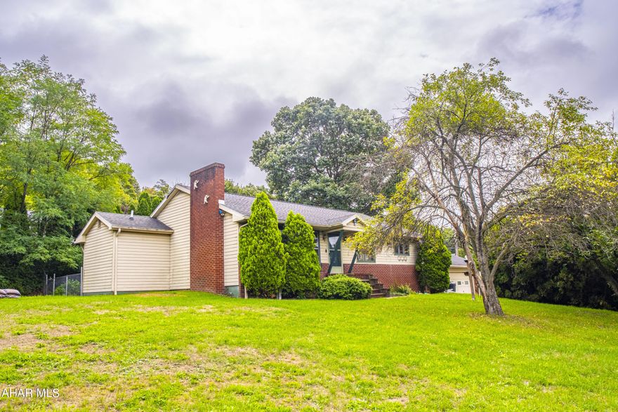 BACK ON MARKET AT NO FAULT OF HOME!! Welcome to this stunning ranch-style home. Great  fixer upper opportunity and a true gem sitting on over half an acre of land in the Hollidaysburg School District! This delightful residence features 3 spacious bedrooms, and 2 bathrooms, perfect for comfortable living. Step into the inviting dining room, which flows seamlessly into the kitchen, creating an ideal space for entertaining family and friends. 

One of the standout features is the amazing bonus room conveniently located right off the large 2 car attached garage, providing extra space for a home office, playroom, or family room. Enjoy the comfort of central air throughout the home and take advantage of the expansive yard adorned with lush bushes, offering plenty of privacy for your outdoor activities. With a little TLC, transform this house into your dream home!!