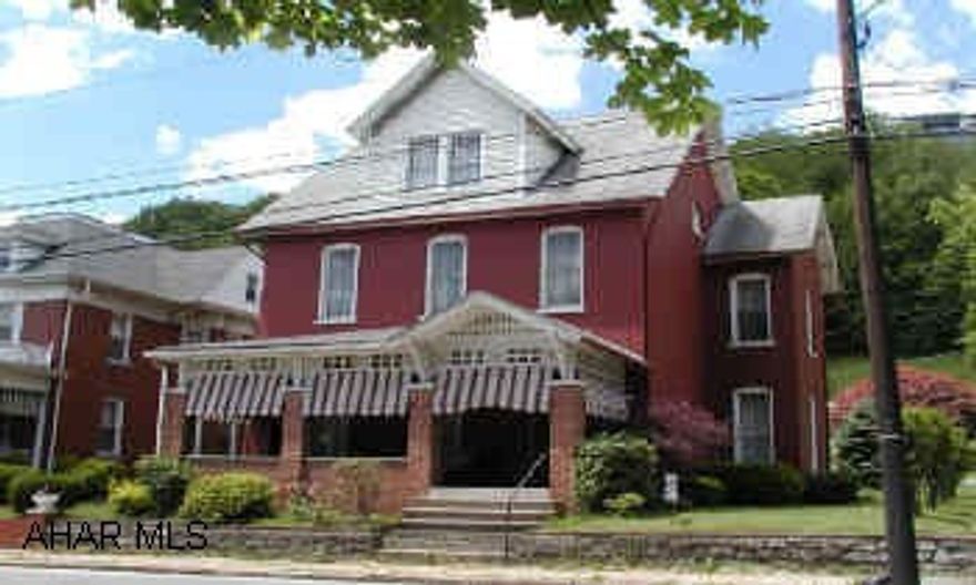 2 1/2 story brick home with 2 car detached garage. 2 1/2 story brick home with 2 car detached garage.