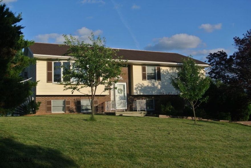 Rolling Hills. Large split entry home on .37 acres. Great views. Fenced rear yard, swimming pool. Spacious deck with all season gazebo. Hot water, heat and central air. Gorgeous kitchen w/center island. Granite! Tons of storage. All appliances including washer & dryer. Easy to show.  Home Protection Plan included.