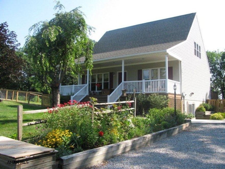 Relax and enjoy in this spacious home on 2 acres in Antis Twp. Bellwood schools. LR., and EIK. w/vaulted ceilings!Sunroom w/gas stove and tongue & groove vaulted ceiling, Finished lower level family room w/workshop area, & french doors to outside! 3BR., 2 full baths and 1/2 bath, oversized 2 car garage! spacious country living front porch and a rear deck too! New energy efficient heat pump system and pellet stove for easy budget heating