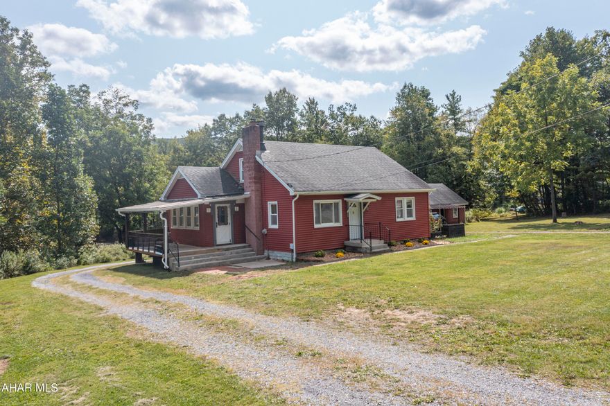 This charming 1.5-story home has the perfect blend of character, comfort, and country living! Featuring 3 bedrooms (with the potential for a 4th), you'll love the flexibility of having 2 bedrooms and a full bath conveniently located on the first floor, with additional bedrooms upstairs. Original hardwood floors, a cozy fireplace, and an updated kitchen add warmth and style throughout.

Just off the kitchen, you'll find a bright, light-filled room with plenty of windows—ideal as a dining room, sunroom, or even a mudroom, depending on your needs.

Set on approximately 3.42 acres, the property offers a quaint country setting with wooded views at the back, a wrap-around driveway and 5 raised garden beds. Enjoy quiet mornings on the covered side porch swing or gather around a fire on crisp evenings.

Car lovers, hobbyists, or anyone needing extra space will be thrilled with the oversized 3-car garage—complete with electric, built-in cabinets, shelving, and even a walk up second floor for storage.


Spacious closets, move-in-ready condition, and the desirable Sinking Valley location make this home a rare find you won't want to miss!