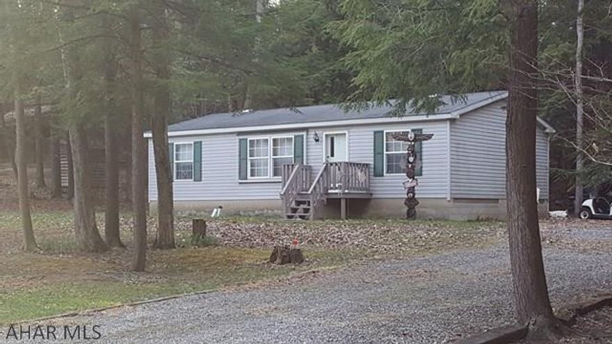 3 bedroom and 2 bathroom Doublewide on a single lot inside Glendale Yearound. This little home is perfect for weekend getaways in the woods or even a full time residence. Glendale Yearound is a gated community located minutes from Glendale Lake and Prince Gallitzin State Park. Community Pool, Security, Basketball, Tennis and more.