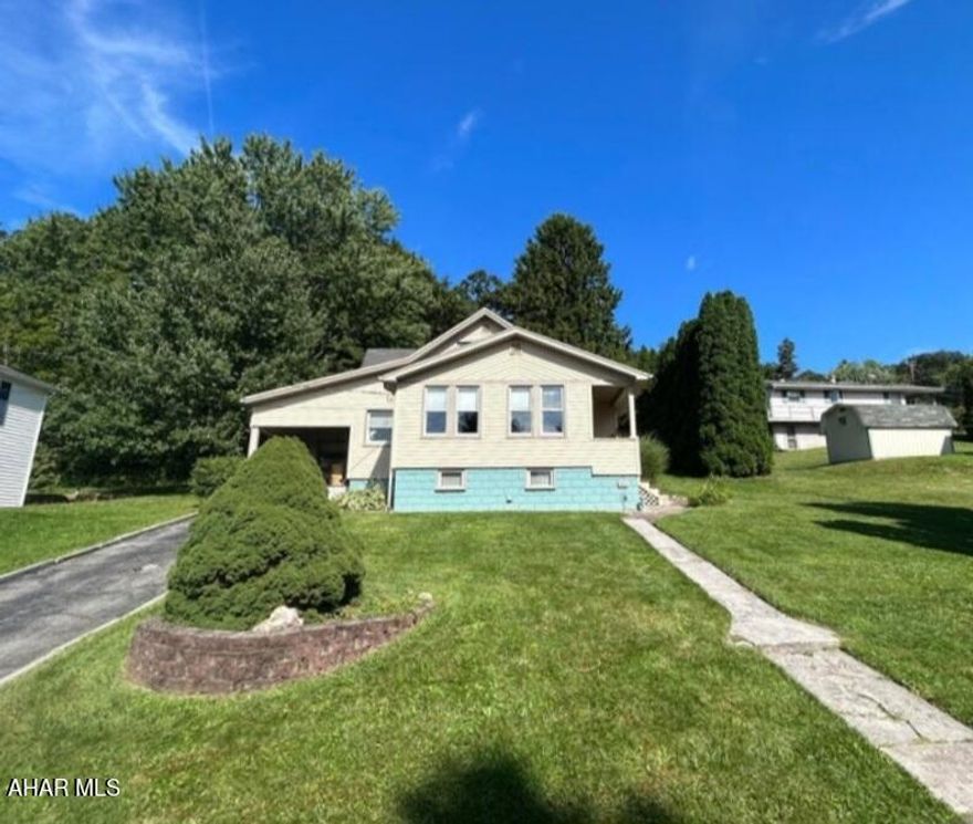 Charming 1.5 story home in a quiet neighborhood in the Lakemont section of Altoona.  This home features 2 bedrooms, with one on the 1st floor, and 1.5 bathrooms (full bath on 1st floor) with the possibility of a 3rd bedroom.  It also features a spacious living room/dining room area and a 1 car garage and carport.  The exterior includes a covered private patio to entertain guests or simply to enjoy for yourself.  This area features a built in charcoal grill.   This home also includes a blacktop driveway, carport and a 1 car garage. Located near Blair County ball park and close to I-99. Call to schedule your showing.  Pre-approved buyers only.  Buyers to confirm taxes, square footage and lot size.