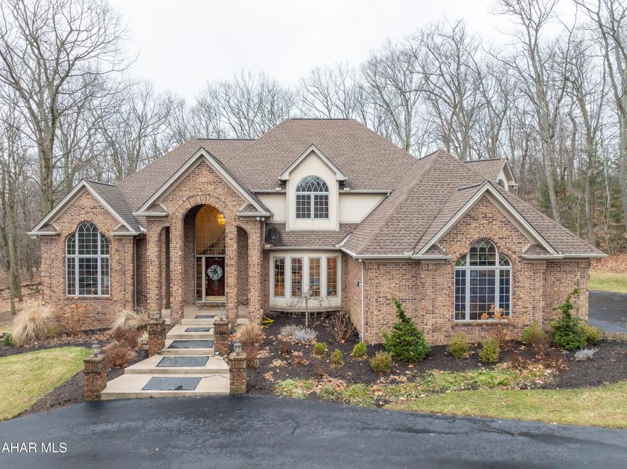 Experience refined luxury in this stunning four-bedroom, six-bathroom estate set on 2.27 private acres. Designed with elegance and comfort in mind, the home features a spacious open floor plan that seamlessly connects living, dining, and entertaining spaces, all filled with natural light. The gourmet kitchen showcases sleek quartz countertops, high-end finishes, and ample room for gatherings both large and intimate.
Each bedroom offers generous space and privacy, each with its own en-suite full Bath, thoughtfully appointed with upscale fixtures and modern design.
The finished basement adds exceptional versatility—ideal for a media room, home gym, or additional living space. A spacious four-season room with a cozy fireplace provides the perfect place to relax and enjoy the surrounding views year-round. 
Additional highlights include a Four Car Garage with a pull down storage space, central air conditioning, a whole-house generator for peace of mind, and expansive outdoor space that enhances the home's sense of privacy and tranquility. This remarkable property blends luxury, functionality, and comfort in a truly exceptional setting.