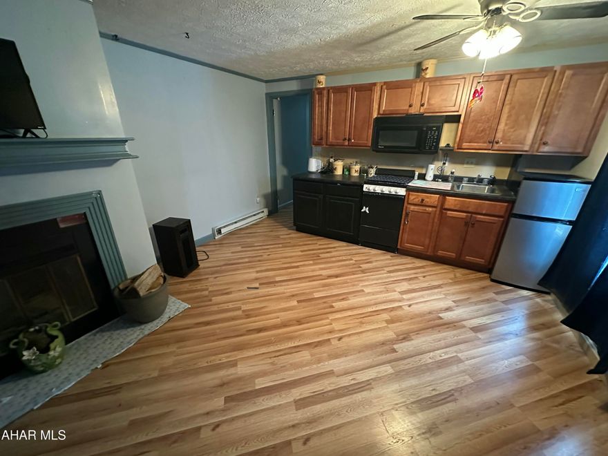 The perfect Blue Knob condo awaits you! Enjoy this first floor one bedroom unit while you use all of the amenities Blue Knob Resort has to offer. This condo has a private bedroom space and two bunks for guests or family. Condo will come with all appliances including stove, refrigerator and microwave. Also included is the living room television and a bed for the primary bedroom. This condo is close to the pools, hot tub and bar and grill. Enjoy hiking in the summer or skiing in the winter and so much more. Visit their website for more information on all of the fun attractions. $258 per month HOA fee includes pool usage, hot tub access, gym, tennis, pickle ball courts, garbage collection and all building and property maintenance.