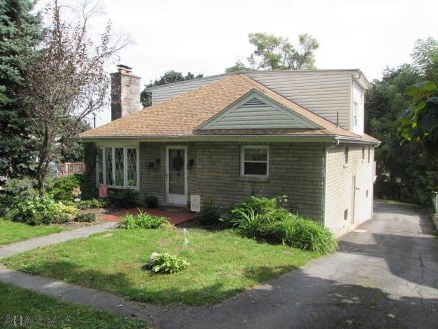 Charming home on Ruskin Drive! Lovely eat-in kitchen that features tile floors, tons of cabinets, and a center island. Spacious living room with a cozy fireplace. Open floor plan from eat-in kitchen to living room. All 3 bedrooms on the first floor have large closets and original hardwood floors. Beautiful master bedroom on the second floor with a walk-in closet. Master bathroom has tile floors and a double vanity. You will love the view from the first floor deck! New furnace and AC in 2015. 3 car garage would be great for storage and a workshop. Enjoy fall evenings next to the outdoor fireplace.