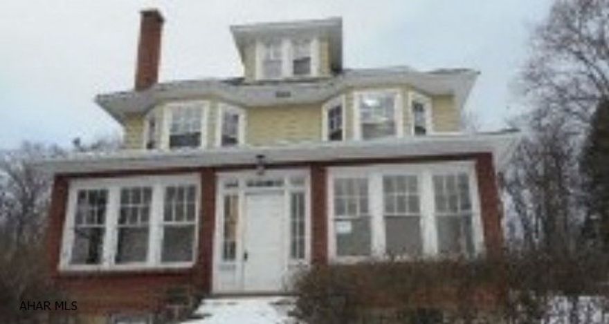 Don't miss out on this spacious two story with original woodwork, hardwood floors, enclosed front porch, master bedroom with full bath, finished attic would make a great office or man cave, some tlc would make this the perfect home
