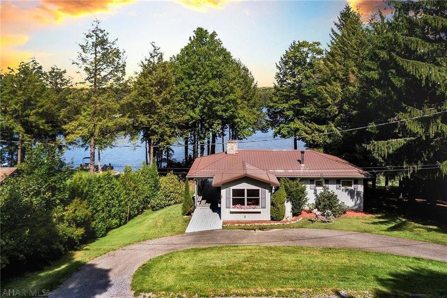 Lakefront, 127 Ithaca can be considered an eleemosynary case!  Ithaca is a 1 way street to the lake & when you pull into 127s governors driveway, you are greeted by a cute ranch set in front of huge trees trimmed up to expose the lakefront view!Enjoy the level entry to the covered deck. Flat backyard.  a wall was taken down to make 1 big bedroom making the house a 2 bedroom.  It can easily be put back up to be a legit 3 bedroom.