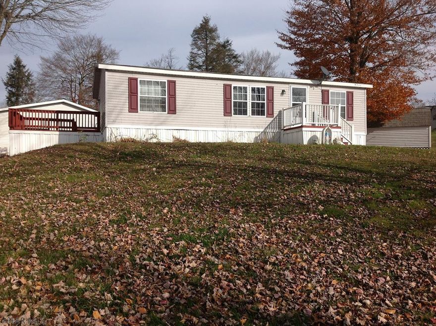 Looking for a place to put your college kids? This home is perfect or a forever home!  Very quiet and well run mobile home park - Laurel Woods.