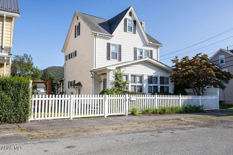 Welcome to 401 E Grant Ave! This Blair County gem greets you with a versatile bonus room perfect for an office, recreation space, or whatever you need. Natural light pours in through plenty of windows. The open-concept first floor offers a spacious living room, dining area, kitchen, and a sit-up bar. Upstairs, you'll find three roomy bedrooms and a full bathroom with a shower-tub combo. Master includes large walk in closet.  The third bedroom has built in beds. Outside, enjoy a covered deck and a flat fenced in yard, ideal for lawn games. The garage features a carport and an extra room for storage, a workout space, or an office. With hot water and natural gas heat, this home offers easy living in the heart of Grant Ave. Located in the Altoona area school district, it's close to I-99, the hospital, stores, and all the fun Altoona has to offer. Fall in love with this home and schedule your showing today! MOTIVATED SELLER!!!!