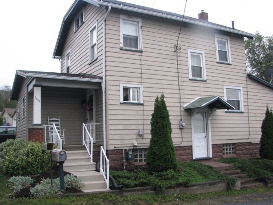 If you want to get a lot of home for your money you just found it.  Home is freshly painted throughout and new flooring was installed just last week.  Kitchen has received a face lift with a beautiful tongue & groove ceiling installed in the outer area and enhanced with crown molding.The cupboards received all new hardware and a beautiful tin back splash was installed. The three bedrooms will have new windows installed next week.They have a transferable warranty to the new homeowner. You will love the large bathroom. It was very tastefully remodeled just this year. The extremely large yard is totally fenced in. There is plenty of off street parking.  The furnace is 6 years old. The electrical was updated 5 years ago and new insulation was installed. Like I said, a lot for your money