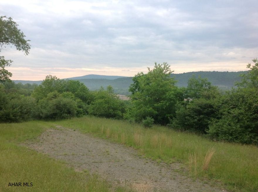 Great location and very private but just a few minutes to Shawnee State Park.This property would make a great hunting retreat, home ,or just a weekend cabin.Property has electric . Beautiful view makes this exceptional and  a great property to do many things with and has a small stream on it. Lots of wildlife.