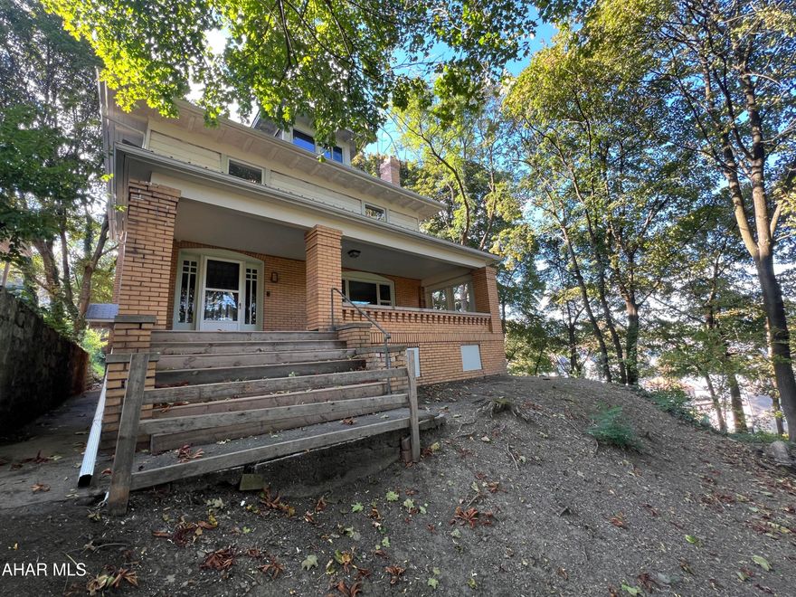 Turn of the Century Beauty with Modern Upgrades! Come home to this beautifully preserved 1900-built home where you will be greeted by the warmth of original woodwork, built-in cabinetry, and the timeless beauty of stained glass
windows in the foyer and formal dining room—details that simply can't be replicated today. Thoughtfully upgraded in 2024 and 2025, the home now features a metal roof, energy-efficient windows, a new on-demand furnace, and updated plumbing and paintwork—preserving its
legacy while providing modern-day ease.
Upstairs, you'll find three comfortable bedrooms and a full bath with convenient second-floor laundry. The walk-up attic offers endless potential— think 4th bedroom or office! Out back, you'll find off-street parking via the alley, with enough space for multiple vehicles or
even a future garage. While there's no traditional backyard, the elevated front yard offers charm and privacy.
Whether you're a lover of historic architecture or just looking for something that feels special, this home is ready to welcome you. Come for the charm. Stay for the updates. Leave with the keys.