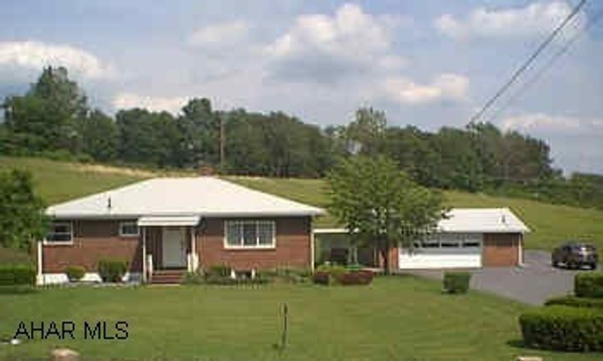 2 Separate garage - Integeal & detached... Ultra blue light on well/windows & roof 2 years old. House has public water in front of house, needs hookup.  Lot is aprox 2 acres and is deeded separately into 2 parcels